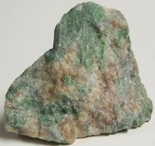 rodingite: green Cr Diopside, orange Grossular garnet, Hunting Hill quarry (Rockville Crushed Stone Quarry; Travilah Quarry; Rockville Quarry; Bardon Stone Quarry; Aggregate Industries Quarry), Rockville, Montgomery County, Maryland, USA