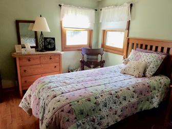 picture of one twin bed and dresser