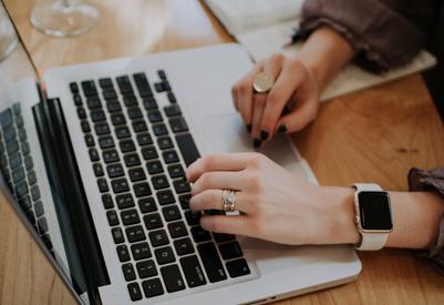 lady typing on a laptop
