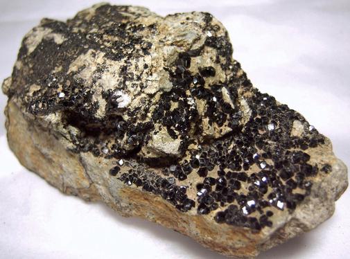 Titanium ANDRADITE MELANITE, California State Gem Mine (Dallas Gem Mine; Benitoite Gem Mine; Benitoite Mine; Gem Mine), Dallas Gem Mine area, San Benito River headwaters area, New Idria District, Diablo Range, San Benito County, California, USA, ex Rutgers Geology Museum