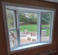 Bay window painted white, Mansfield, MA.