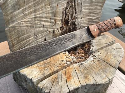 DIY Machete Makeover. Clean up the old rusty machete by adding a carved basket weave handle and celtic metal etching. www.DIYeasycrafts.com