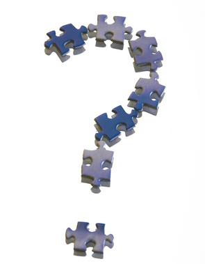 Graphic of puzzle pieces forming a question mark.