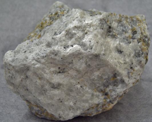 fluorescing NORBERGITE, FLUOROPHLOGOPITE, GRAPHITE, CALCITE - Franklin Quarry (Braens Quarry; Moses Bigelow Quarry; Farber Quarry), Franklin Marble, Franklin, Franklin Mining District, Sussex County, New Jersey, USA
