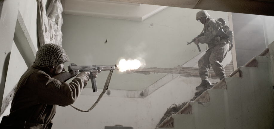 WW2 US army sergeant firing Thompson at SS soldier