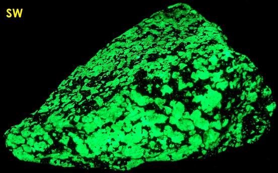 fluorescent WILLEMITE, red ZINCITE, black FRANKLINITE - Franklin Mine, Franklin, Franklin Mining District, Sussex County, New Jersey, USA, type locale, gneiss ore