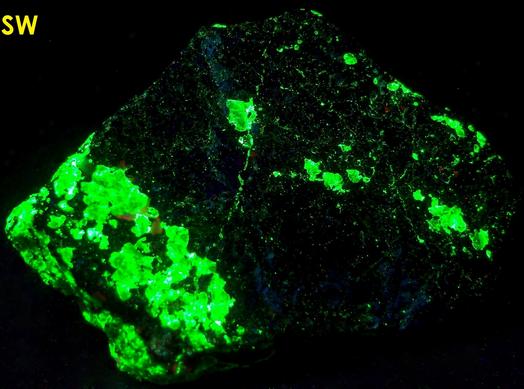fluorescent WILLEMITE, HYDROZINCITE, CALCITE, FRANKLINITE and ZINCITE - Sterling Mine, Sterling Hill, Ogdensburg, Franklin Mining District, Sussex County, New Jersey, USA – Franklinite and Zincite type locality