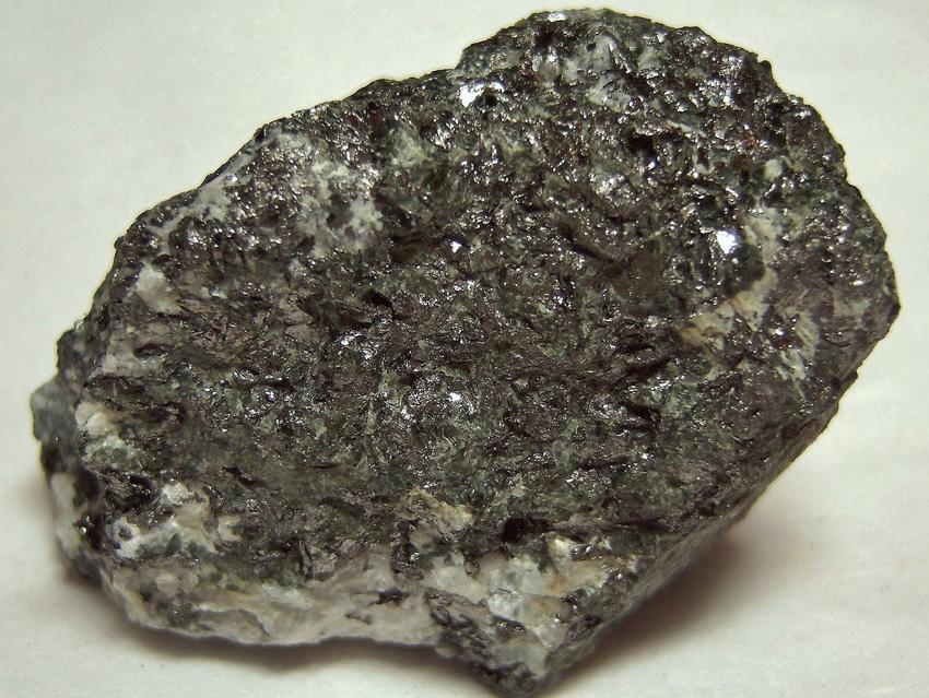 Graphite, fluorescent Meionite Scapolite, green pyroxene - Lead Hill Mines (Chilson Hill mine), Ticonderoga, Ticonderoga Township, Essex County, New York, USA