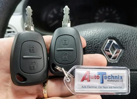 Two Renault Kangoo original van keys facing with blades upwards