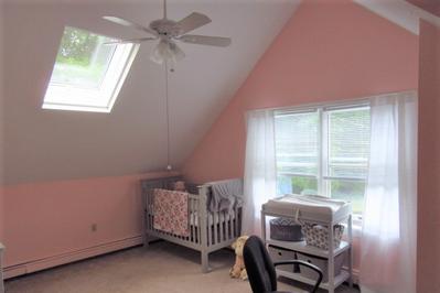 Baby's room after painting it pink.