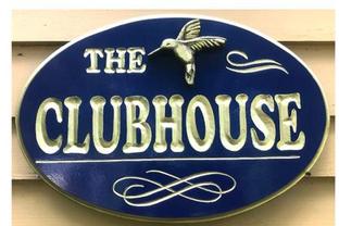 Oval carved sign for customer in California