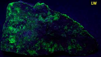 phosphorescent fluorescent WILLEMITE, ZINCITE, FRANKLINITE, CALCITE,Sterling Mine, Sterling Hill, Ogdensburg, Franklin Mining District, Sussex County, New Jersey, USA