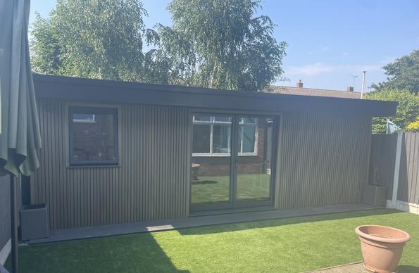 Large modern garden room with pool table and bar