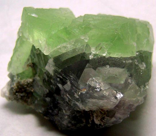 green Fluorescent FLUORITE, CALCITE poker chips, Xianghualing Mine (Hsianghualing Mine), Xianghualing Sn-polymetallic ore field, Linwu County, Chenzhou Prefecture, Hunan Province, China - ex Parker Minerals