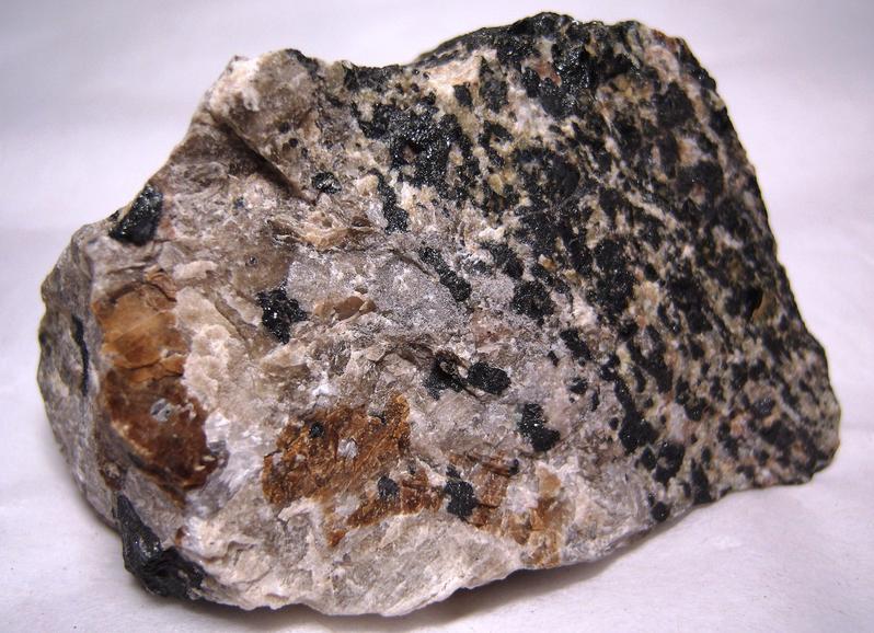 fluorescing Hardystonite, Willemite, Calcite, black Franklinite, brown Zn-Diopside Zinc Schefferite - Franklin Mine, Franklin, Franklin Mining District, Sussex County, New Jersey - type locality