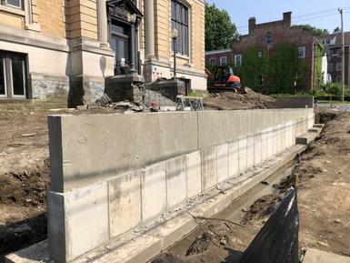 Close-up of exposed concrete retaining wall