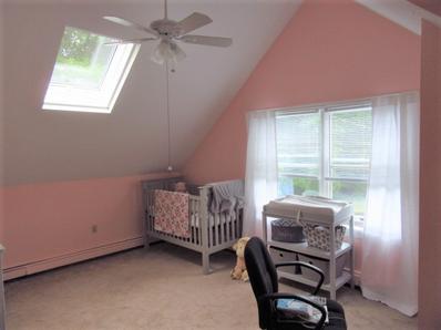 New baby's room in Berkley after painting it pink.