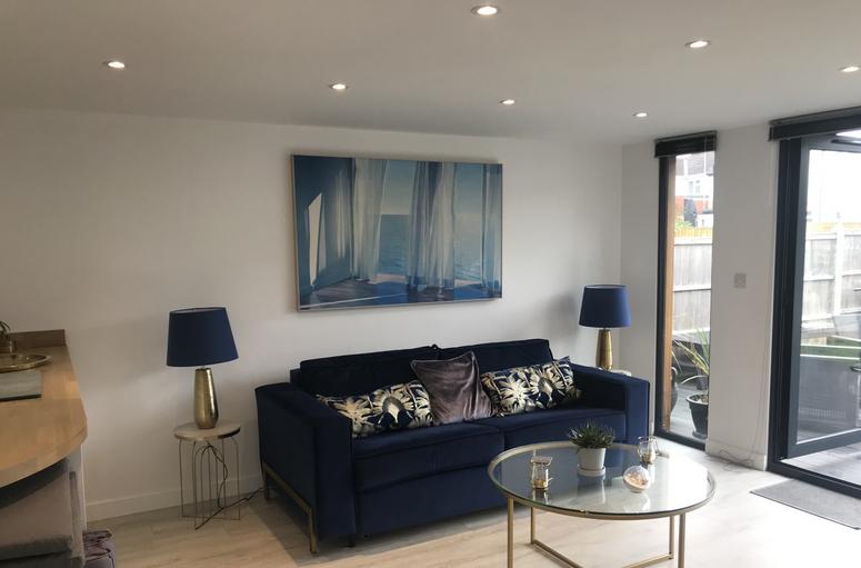 Large modern garden room with pool table and bar