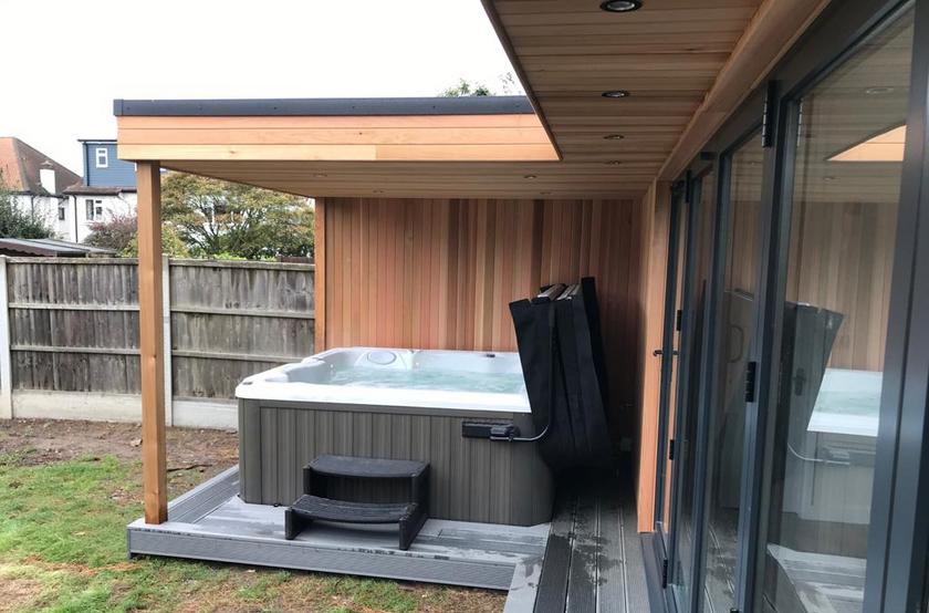 Large modern garden room with pool table and bar