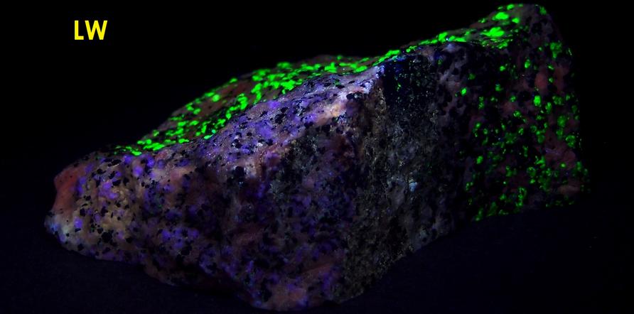 fluorescing Willemite, Hardystonite, Rhodonite, Franklinite, Calcite -Franklin Mine, Franklin, Franklin Mining District, Sussex County, New Jersey, USA