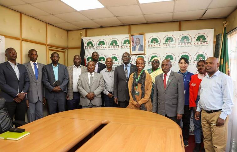 The delegations pose for a photo after the courtesy visit at the Kenya Forest Service headquarters