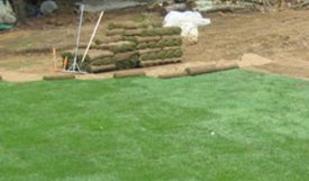 image of new sod being put down by Presentato Landscape