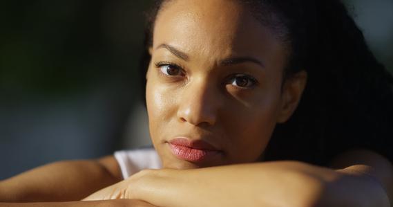 AA woman, law client, Black Woman looking pensive