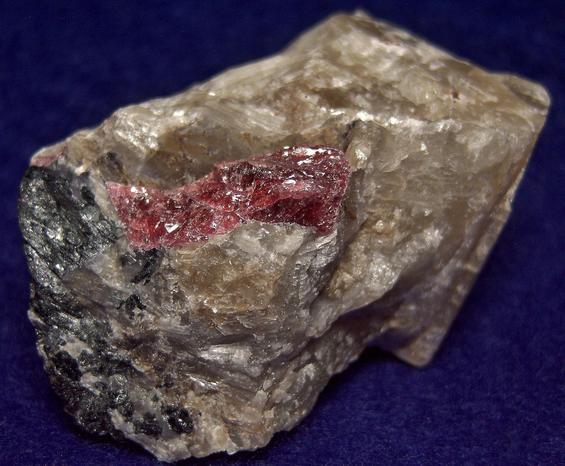 Pink SW LW fluorescing Agrellite, Eudialyte, Britholite-(Ce) crystals,Amphibole, Kipawa alkaline complex, Les Lacs-du-Temiscamingue, Temiscamingue RCM, Abitibi-Temiscamingue, Quebec, Canada
