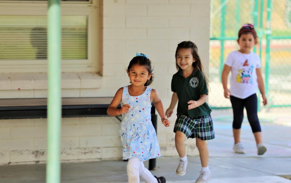 Young Girls Running at St. Rose-McCarthy