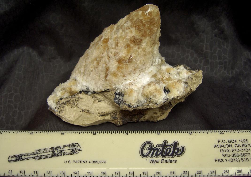 fluorescent calcite, asphaltum, Clay Center, Ottawa County, Ohio, ex Robert Batic, ex Kohnowich
