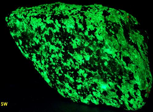 fluorescent CALCITE, phosphorescent WILLEMITE with FRANKLINITE, Sterling Mine, Sterling Hill, Ogdensburg, Franklin Mining District, Sussex County, New Jersey, USA, type locality