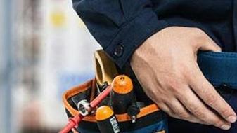 handyman wearing a tool belt