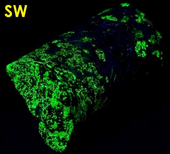 fluorescent phosphorescing Sphalerite Cleiophane, Willemite, Zincite, Franklinite, Magnetite, Calcite - Franklin, Franklin Mining District, Sussex County, New Jersey, USA