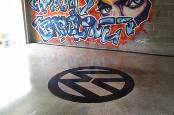 polished concrete in garage with volkswagen logo