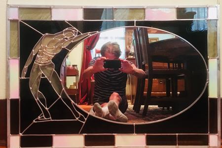 Stained glass mirror of male dancer in the ballet "Les Fleurs du Monde"