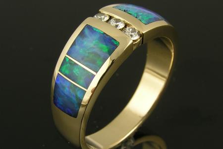 Diamond and opal ring expertly repaired by Hileman.