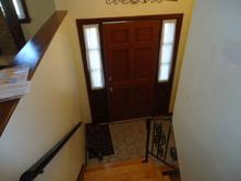 stained interior front door.