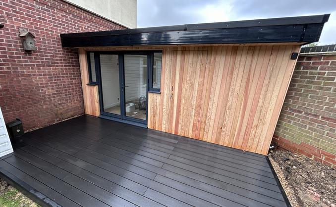 Large modern garden room with pool table and bar