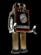 retro robot sculpture art astronaut