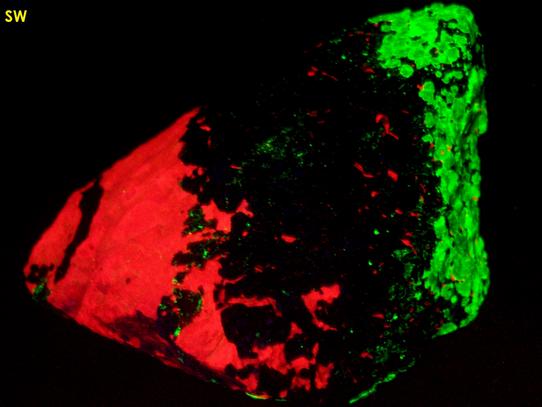 fluorescing CALCITE, WILLEMITE with FRANKLINITE, ZINCITE - Sterling Mine, Sterling Hill, Ogdensburg, Franklin Mining District, Sussex County, New Jersey, USA - type locality