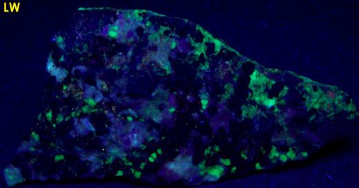 phosphorescent fluorescent WILLEMITE, ZINCITE, FRANKLINITE, CALCITE,Sterling Mine, Sterling Hill, Ogdensburg, Franklin Mining District, Sussex County, New Jersey, USA