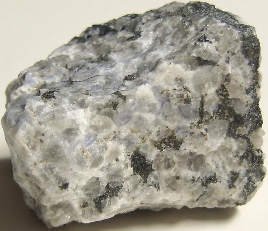 fluorescing SODALITE, AEGIRINE Acmite, FELDSPAR - Poudrette quarry (Demix quarry; Uni-Mix quarry; Desourdy quarry; Carrière Mont Saint-Hilaire; MSH), Mont Saint-Hilaire, La Vallée-du-Richelieu RCM, Montérégie, Québec, Canada