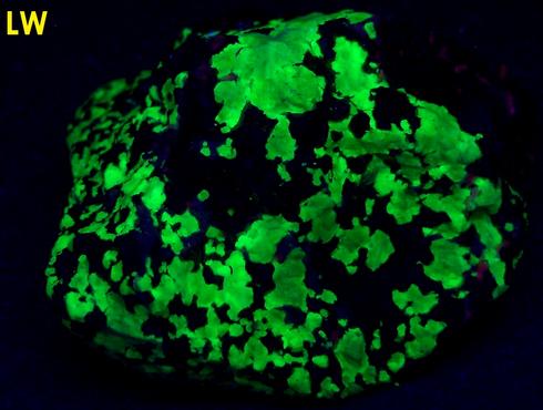 FRANKLINITE-MAGNETITE, fluorescent WILLEMITE, CALCITE - Sterling Mine, Sterling Hill, Ogdensburg, Franklin Mining District, Sussex County, New Jersey, USA - Franklinite type locality - sold