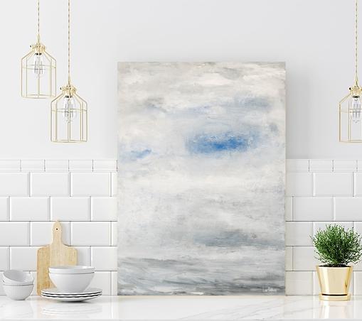 Blue Art ocean seascape in light blue and white which shows calm ocean water and clouds in the sky.