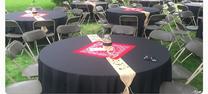 "Round table rental with brown chairs for weddings and events
