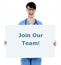 Image of female employee wearing blue scrubs holding a white sign that reads "Join our Team!"