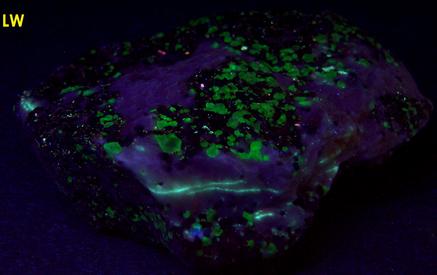FRANKLINITE, fluorescent ZINCITE, SPHALERITE, WILLEMITE, HYDROZINCITE, CALCITE - Sterling Mine, Sterling Hill, Ogdensburg, Franklin Mining District, Sussex County, New Jersey, USA – type locality