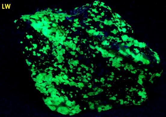FRANKLINITE, ZINCITE, fluorescing WILLEMITE, CALCITE and HARDYSTONITE - Franklin Mine, Franklin, Franklin Mining District, Sussex County, New Jersey, USA - type locality of Franklinite, Zincite, and Hardystonite - sold