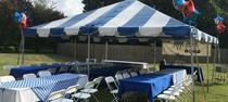 Blue and white rental tent for outdoor events and celebrations