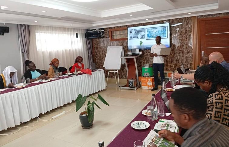 Mwangaza Light representative presents during the opening workshop